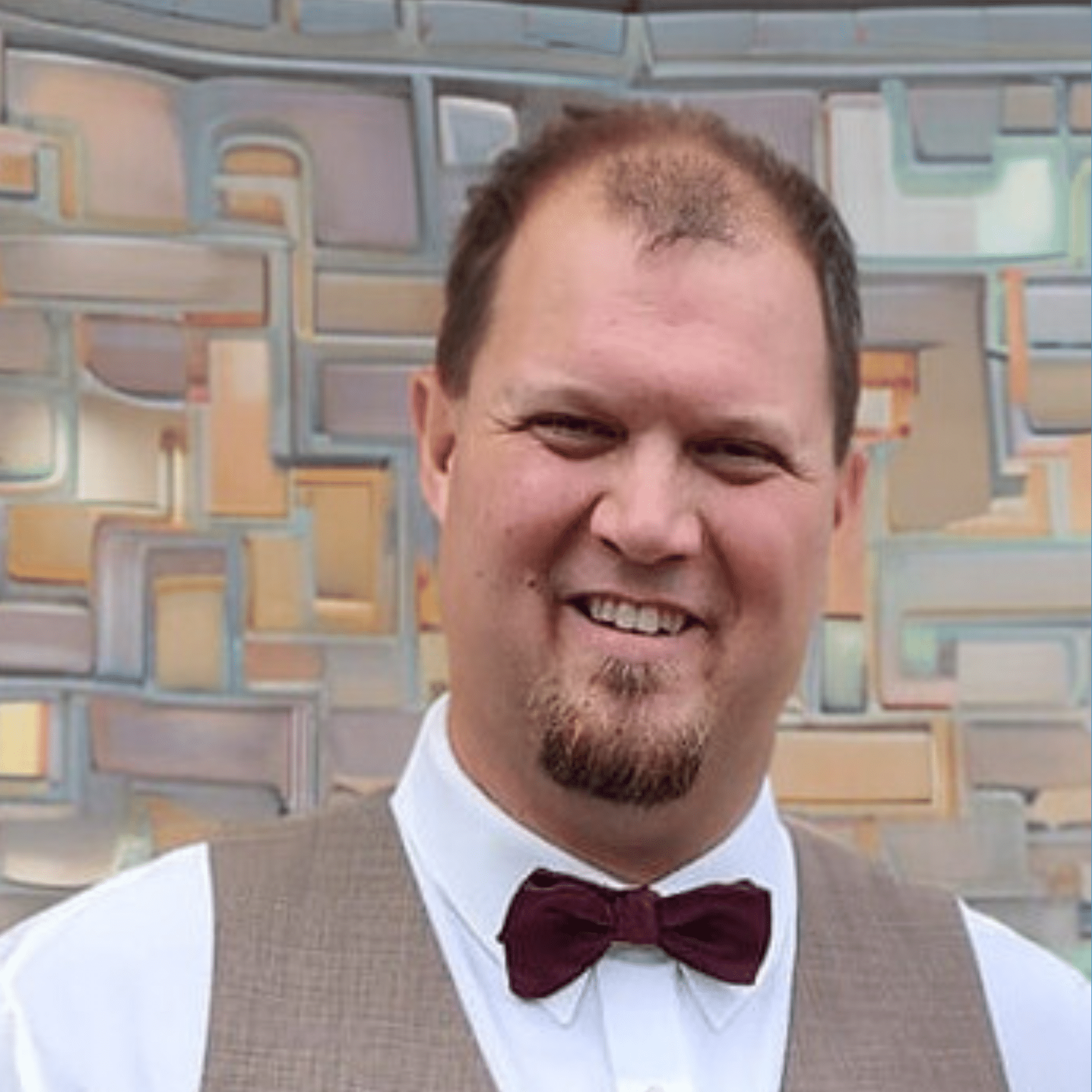 a headshot of alex johnson